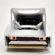 The Porsche’s engine was starved of air. Two tubes, connected to vents on the tunnel wall, directed cool air into the engine compartment.